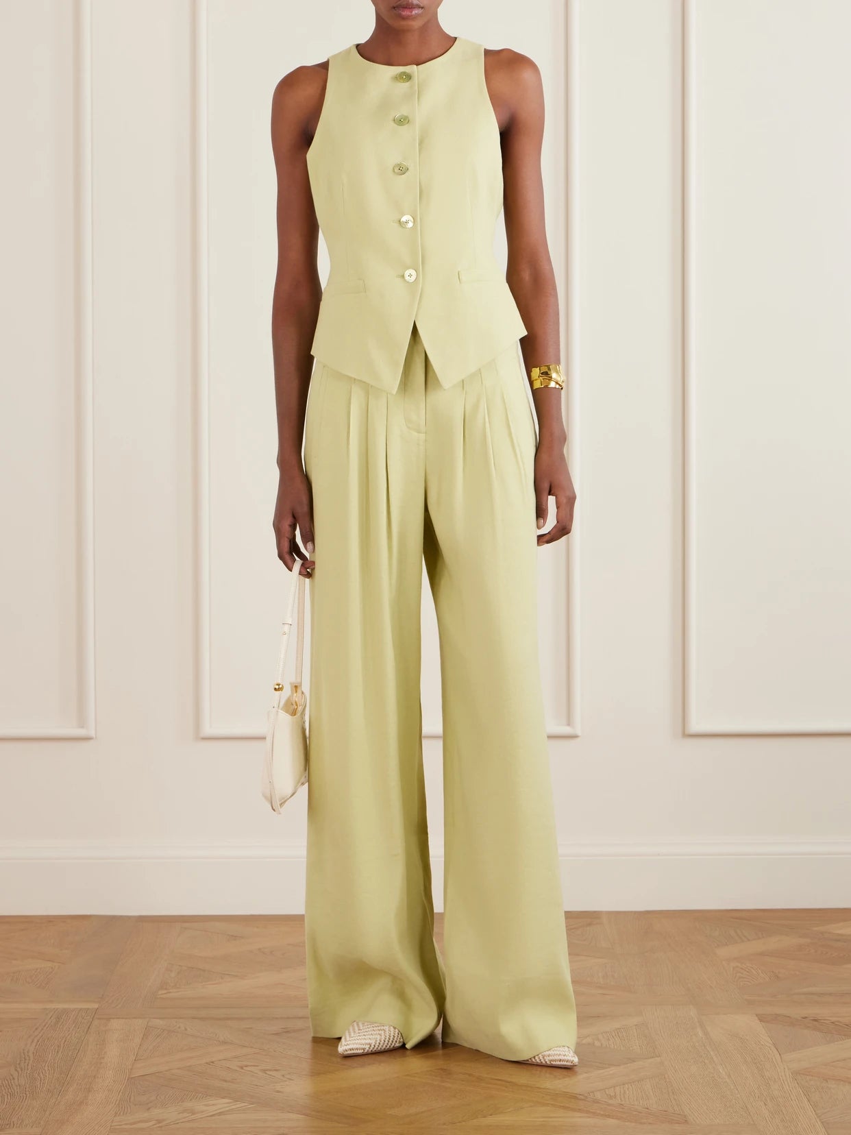 Image of a model wearing Pants. Product name - Hoyt Linen-blend Twill Wide-leg Pants in Light green colour by brand - Veronica Beard
