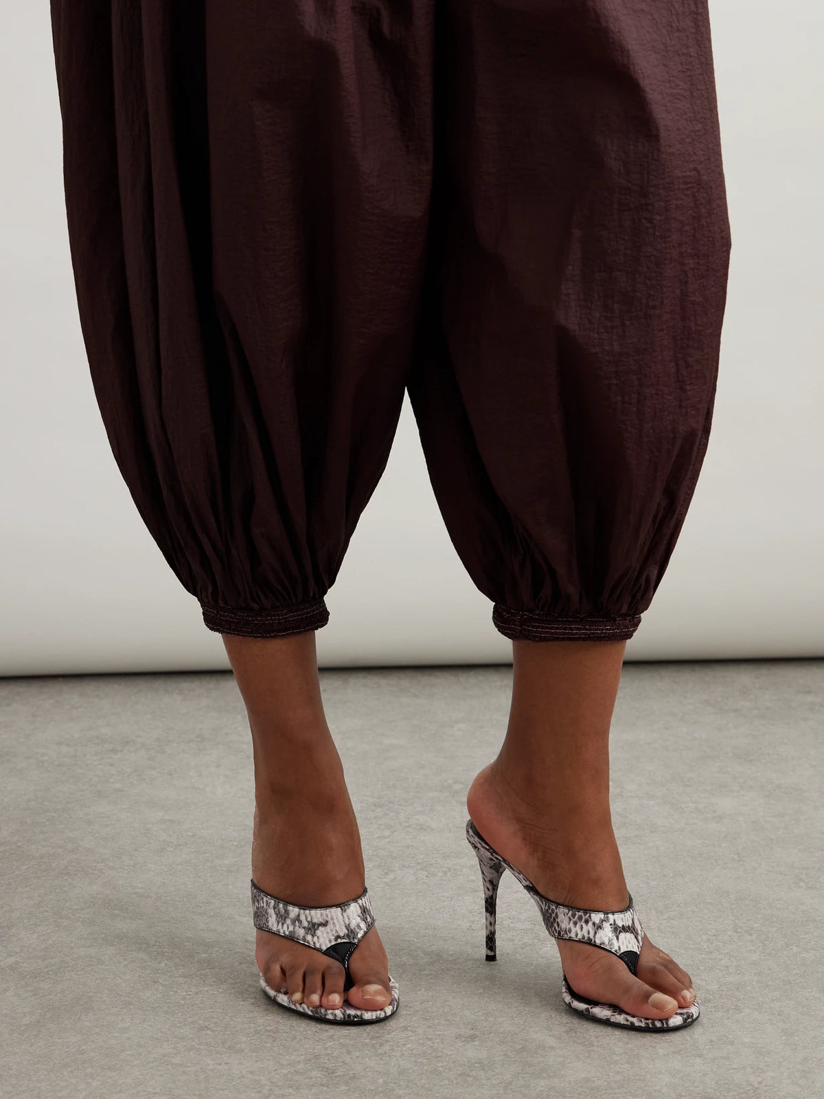 Image of Heels. Product name - Tong 90 Patent Leather-trimmed Elaphe Sandals in Snake print colour by brand - Alaïa