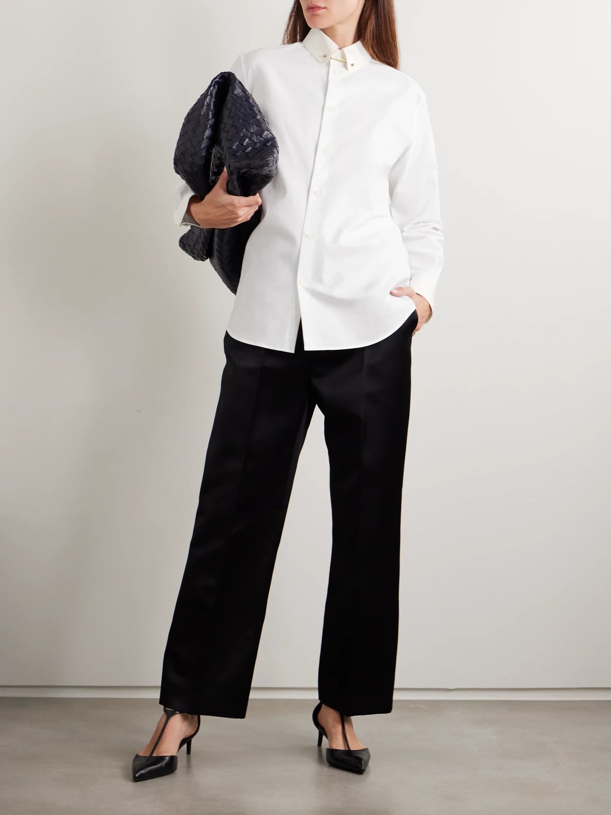 Image of a model wearing Tops. Product name - Thea Embellished Cotton Oxford Shirt in White colour by brand - Loro Piana