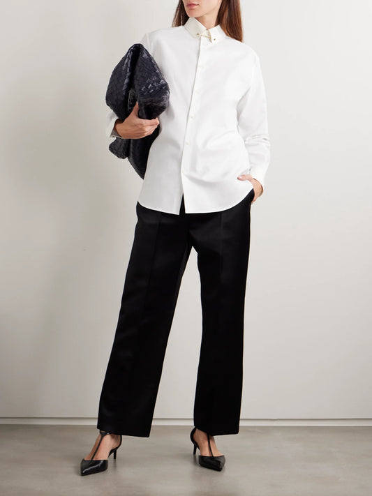 Image of a model wearing Tops. Product name - Thea Embellished Cotton Oxford Shirt in White colour by brand - Loro Piana