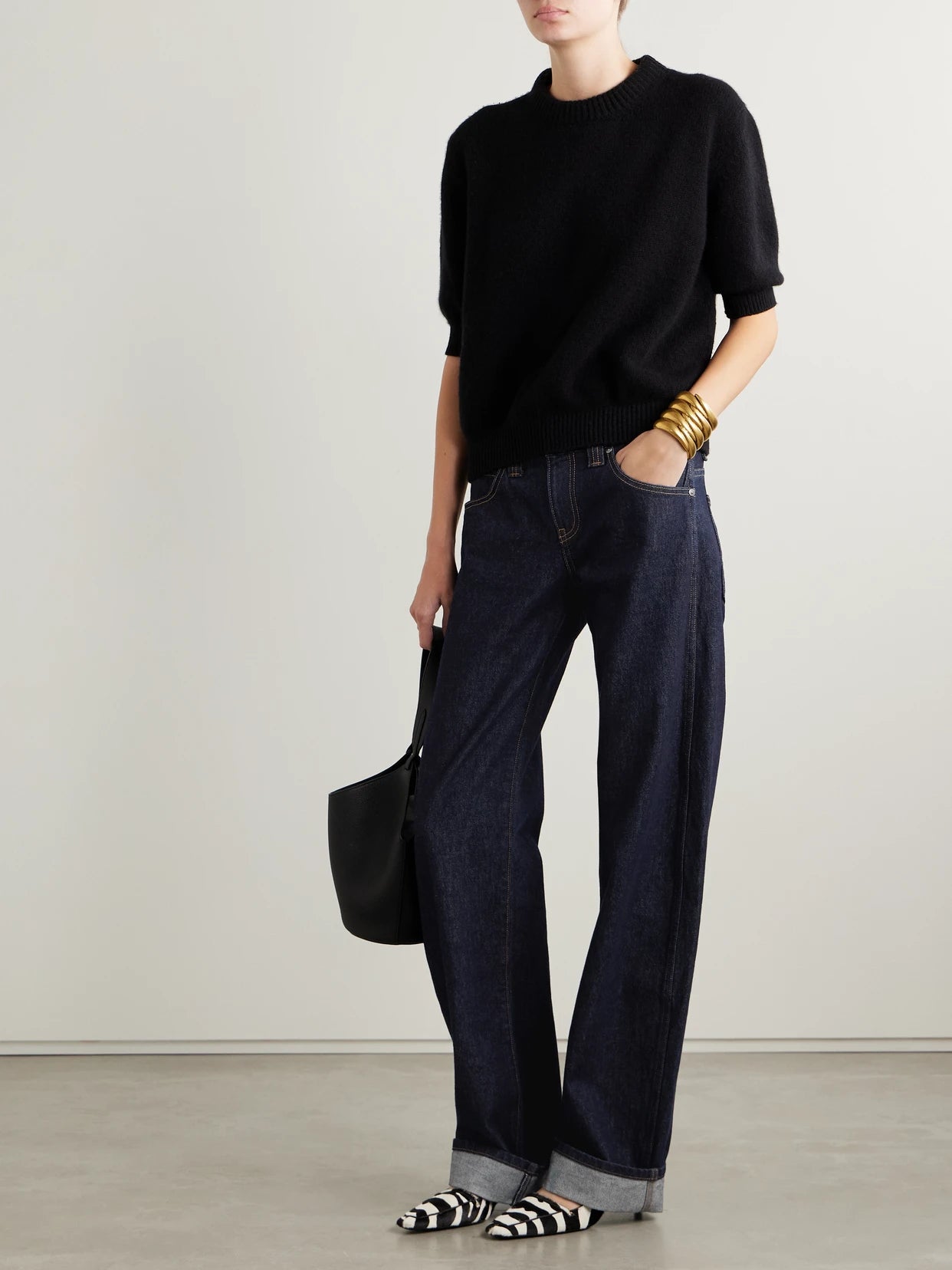 Image of Jeans. Product name - Karo Mid-rise Barrel-leg Jeans in Dark denim colour by brand - KHAITE