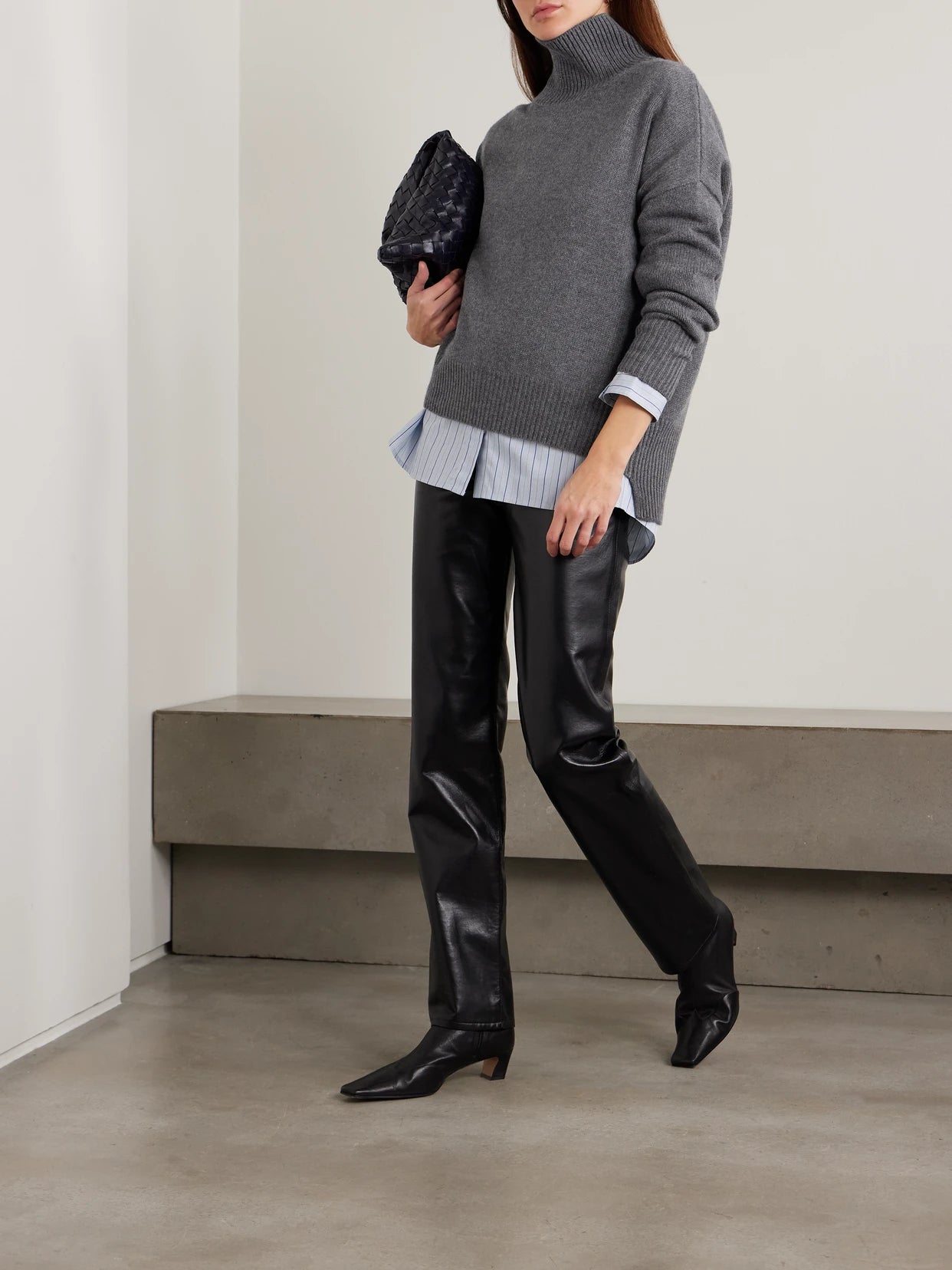 Image of a model wearing Outerwear. Product name - Heidi Cashmere Turtleneck Sweater in Gray colour by brand - LISA YANG