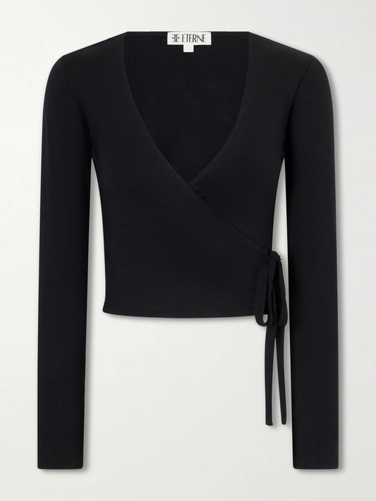 Image of a model wearing Tops. Product name - Wrap Jersey T-shirt in Black colour by brand - ÉTERNE