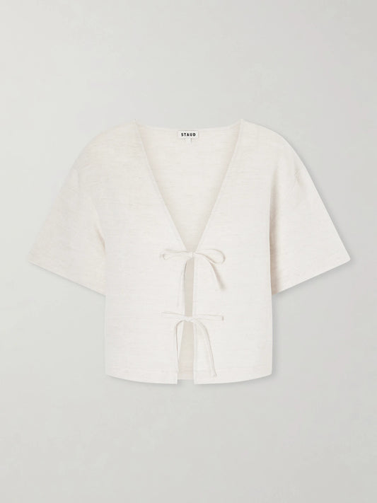 Image of a model wearing Tops. Product name - Ava Linen Blouse in Off-white colour by brand - STAUD