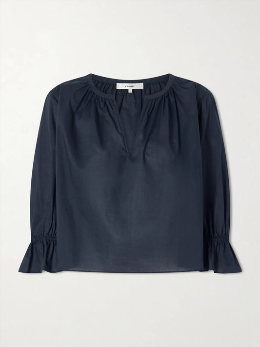 Image of a model wearing Tops. Product name - Poet Cotton Blouse in Navy colour by brand - FRAME