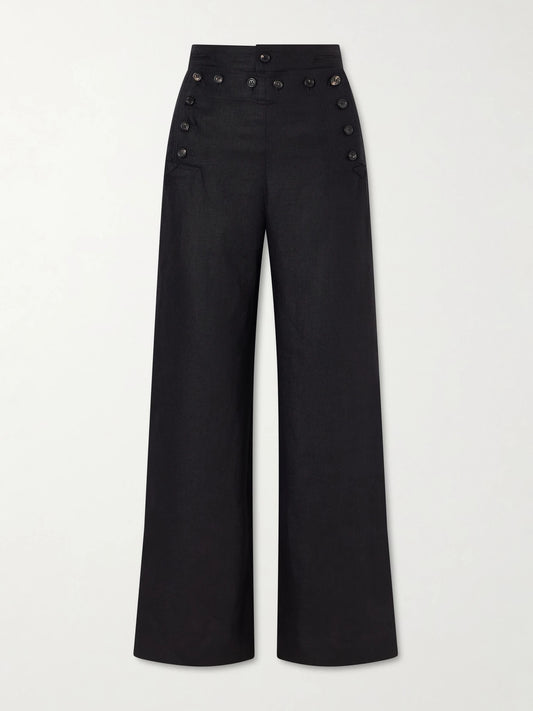 Image of a model wearing Pants. Product name - Sailor Cropped Linen High-rise Wide-leg Pants in Black colour by brand - BODE