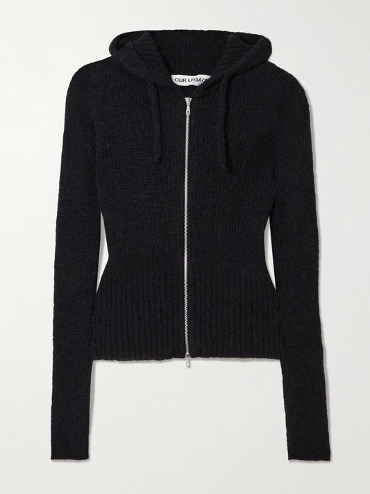 Image of a model wearing Outerwear. Product name - Compact Hooded Ribbed Brushed Alpaca-blend Cardigan in Black colour by brand - Our Legacy