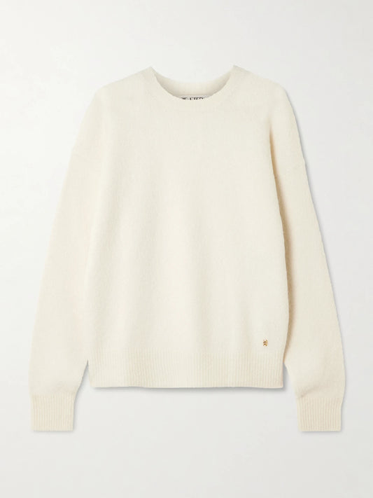 Image of a model wearing Outerwear. Product name - Brock Cashmere-blend Sweater in Cream colour by brand - ÉTERNE