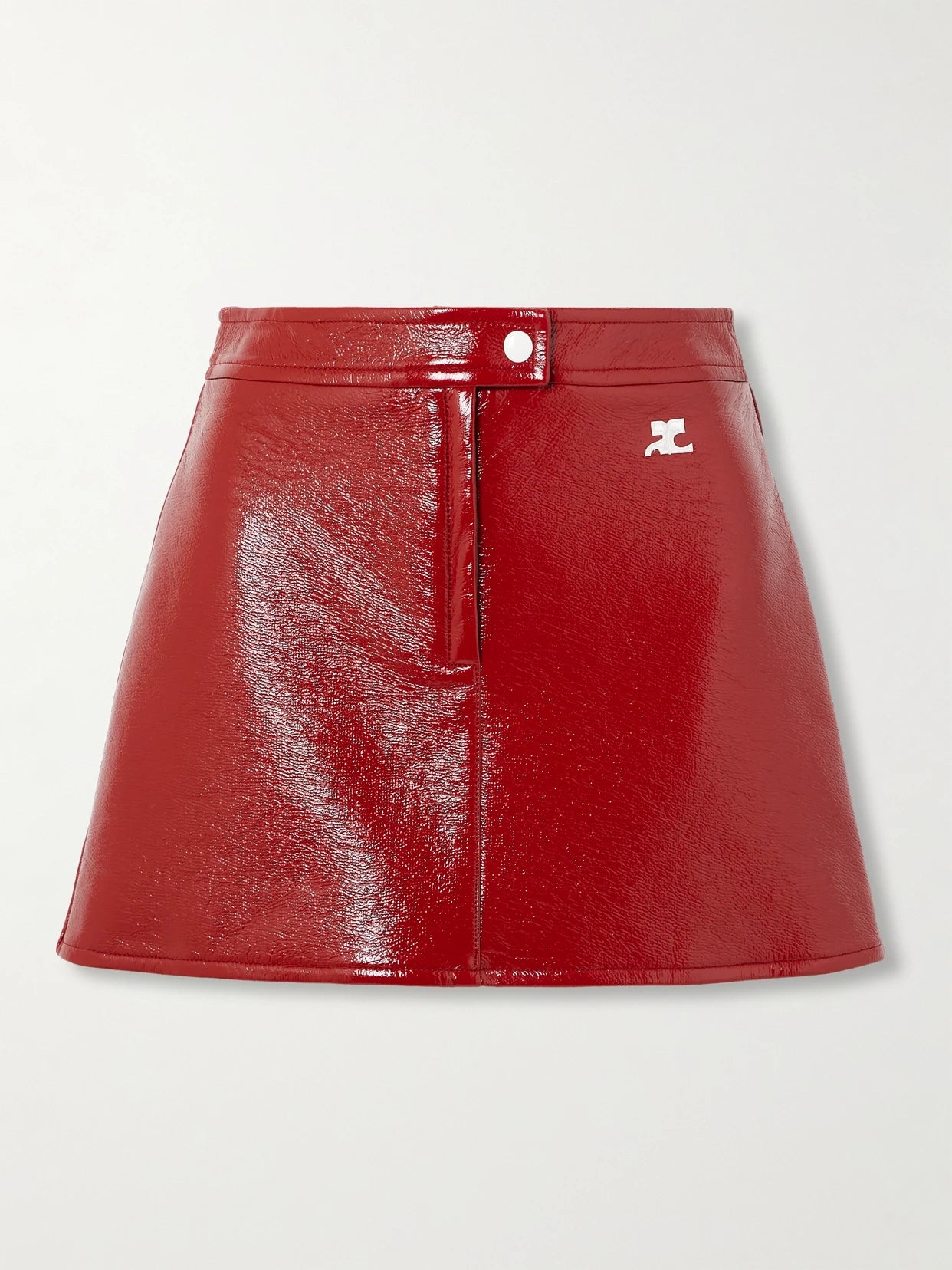 Image of a model wearing Skirts. Product name - Appliquéd Coated Cotton-blend Mini Skirt in Red colour by brand - COURREGES
