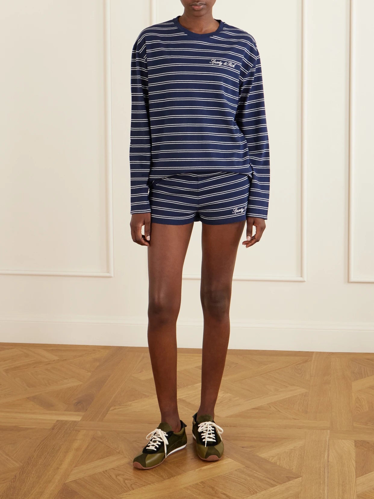 Image of Sleepwear & Loungewear. Product name - Logo-embroidered Striped Cotton-jersey Long-sleeve Top in Navy colour by brand - Sporty & Rich