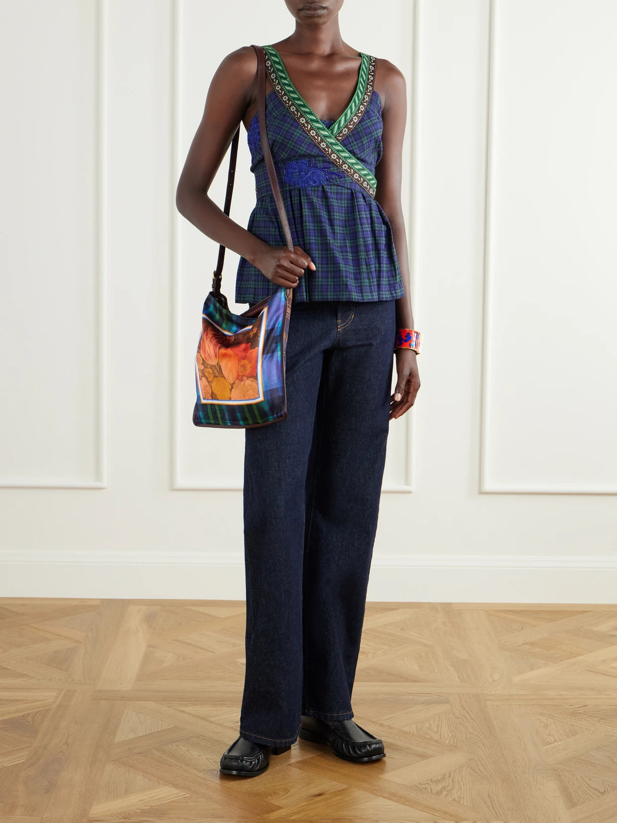 Image of a model wearing Tops. Product name - Embellished Wrap Checked Cotton Top in Multi colour by brand - Dries Van Noten