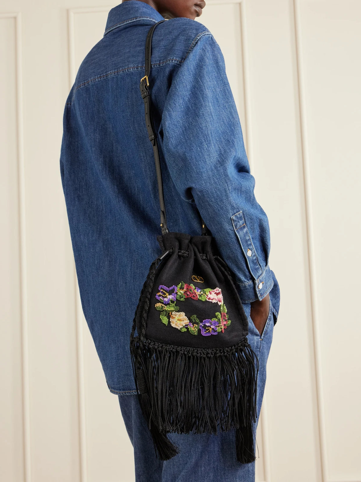 Image of Bags. Product name - Nellcote Alice Sequin-embellished Brass Logo Drawstring Bag in Black colour by brand - Valentino Garavani