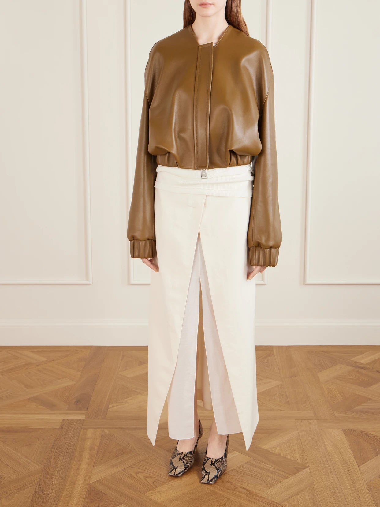 Image of Coats & Jackets. Product name - Cordan Cropped Leather Bomber Jacket in Beige colour by brand - KHAITE