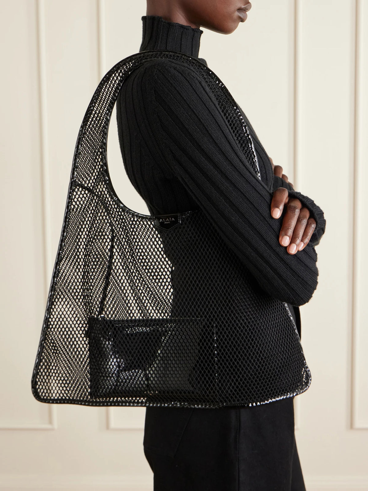 Image of Bags. Product name - Leather-trimmed Crocheted Shoulder Bag in Black colour by brand - Alaïa
