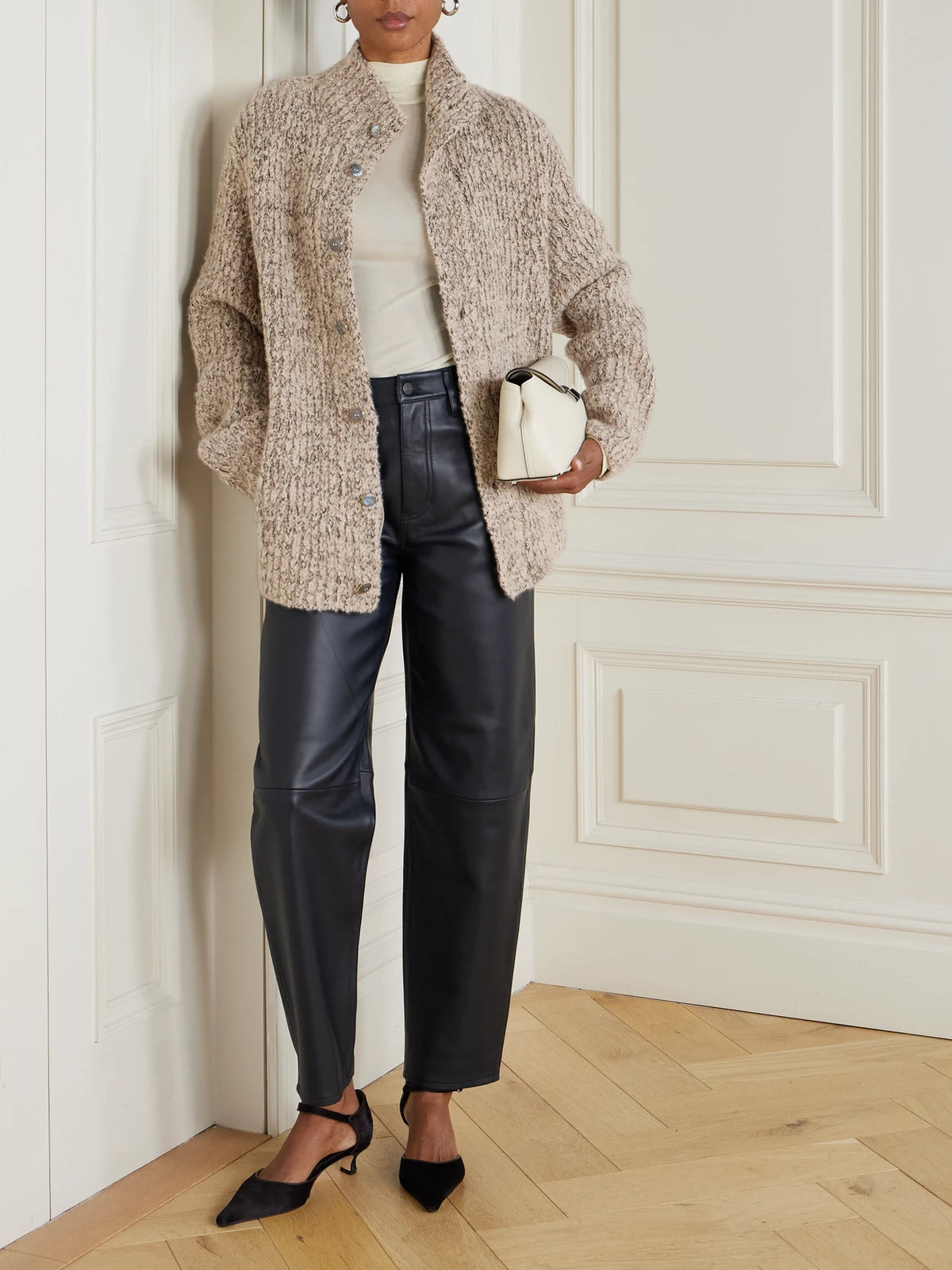Image of a model wearing Outerwear. Product name - Cashmere Cardigan in Taupe colour by brand - God's True Cashmere