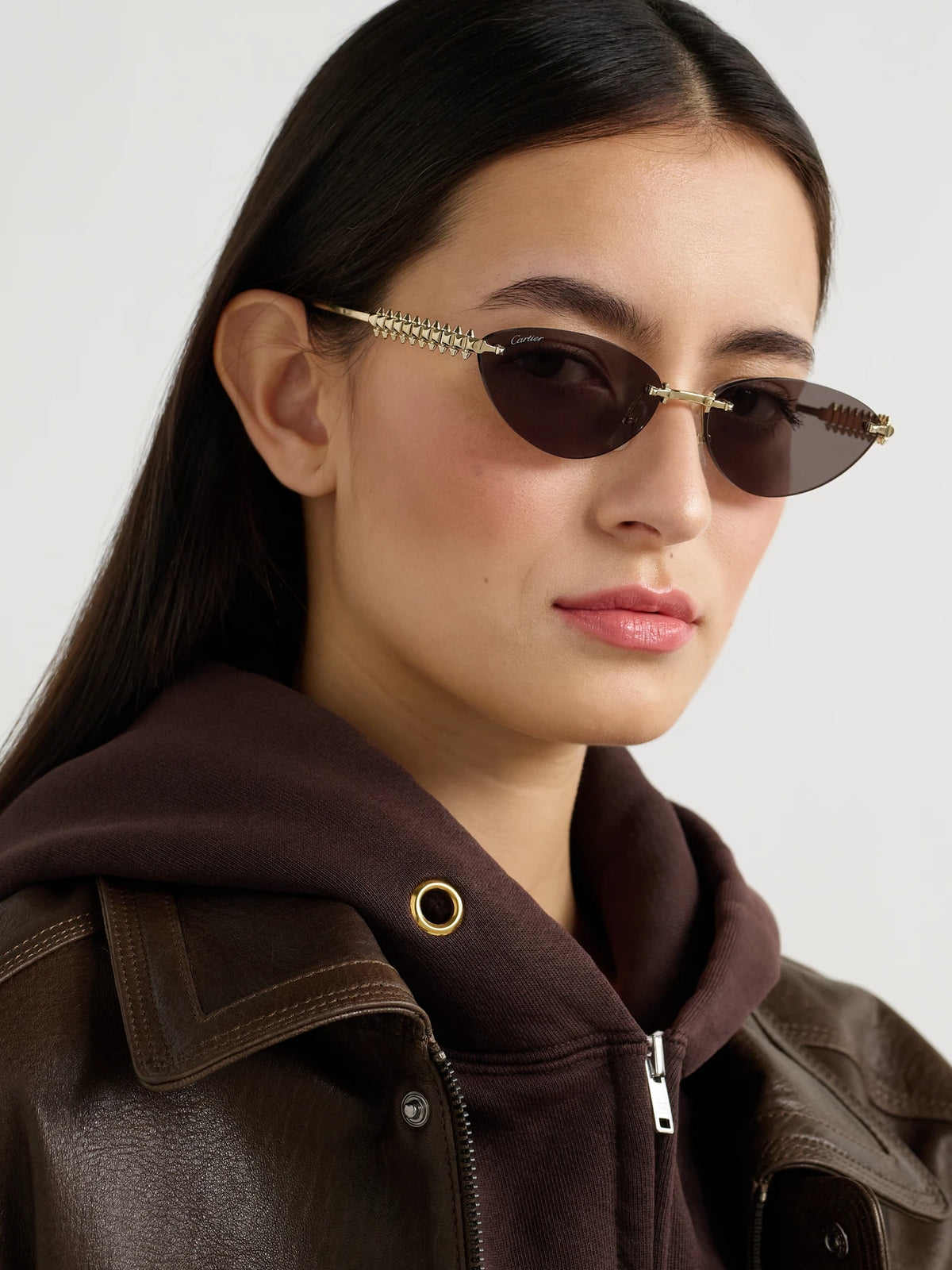 Image of Sunglasses. Product name - Clash De Cartier Rimless Cat-eye Gold-tone Sunglasses in Multi colour by brand - Cartier Eyewear