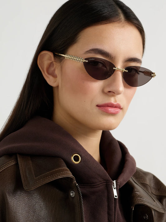 Image of Sunglasses. Product name - Clash De Cartier Rimless Cat-eye Gold-tone Sunglasses in Multi colour by brand - Cartier Eyewear