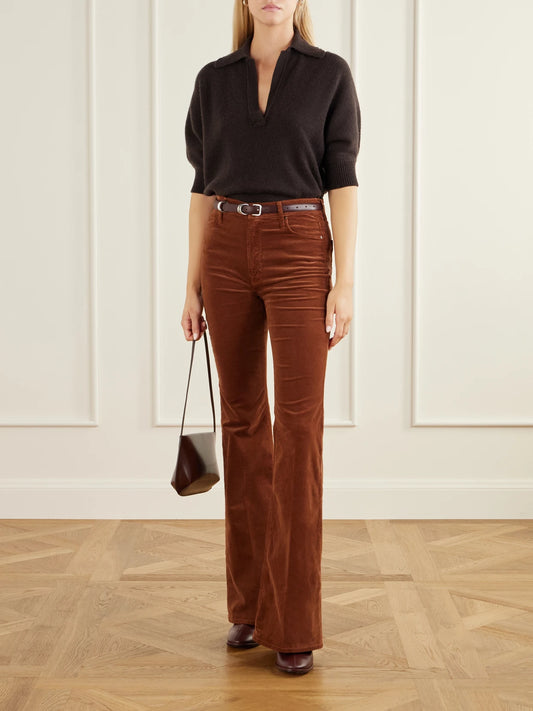 Image of a model wearing Pants. Product name - The Doozy Cotton-blend Corduroy Flared Pants in Brown colour by brand - Mother