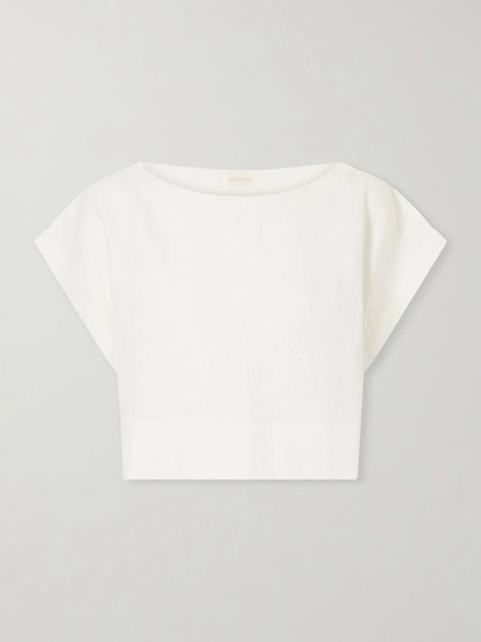Image of a model wearing Tops. Product name - Kori Cropped Linen Top in White colour by brand - Suzie Kondi