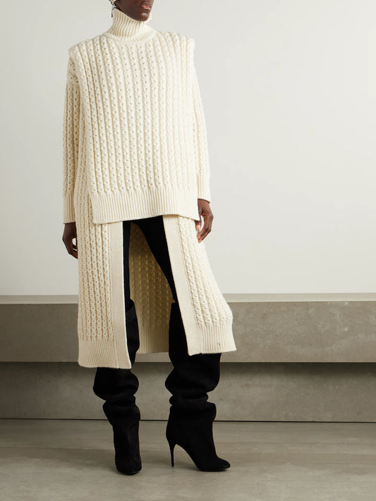 Image of a model wearing Outerwear. Product name - Oversized Wool Cardigan in Ivory colour by brand - Alaïa