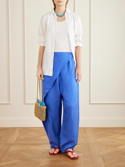 Image of a model wearing Pants. Product name - Tie-detailed Woven Balloon Pants in Cobalt blue colour by brand - Polo Ralph Lauren