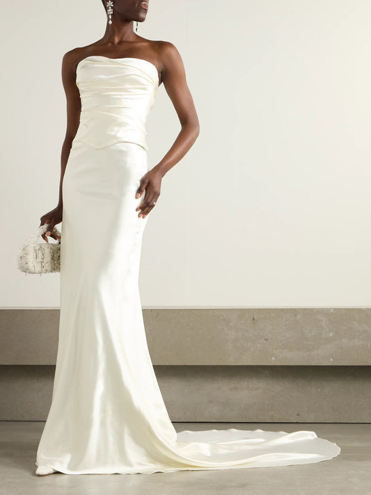 Image of a model wearing Tops. Product name - Demi Strapless Draped Silk And Wool-blend Satin Bustier Top in Off-white colour by brand - Danielle Frankel