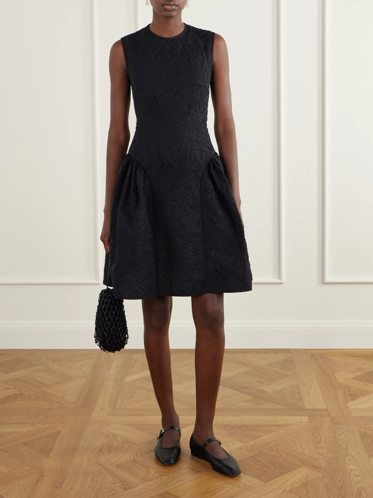 Image of Dresses. Product name - Flodie Matelassé Knee-length Dress in Black colour by brand - Cecilie Bahnsen