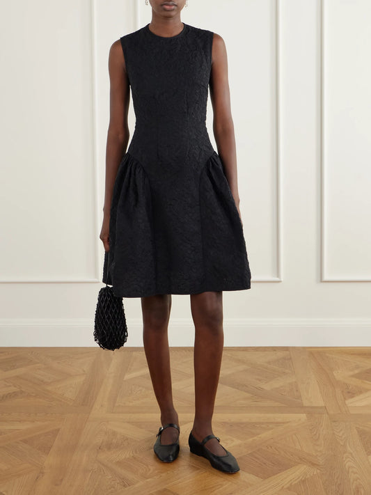 Image of Dresses. Product name - Flodie Matelassé Knee-length Dress in Black colour by brand - Cecilie Bahnsen