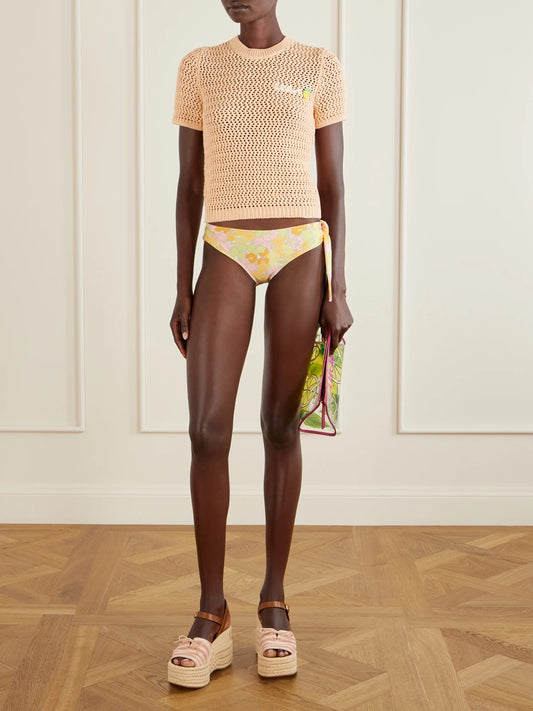 Image of a model wearing Tops. Product name - Logo-embroidered Crocheted Cotton T-shirt in Orange colour by brand - Chloé