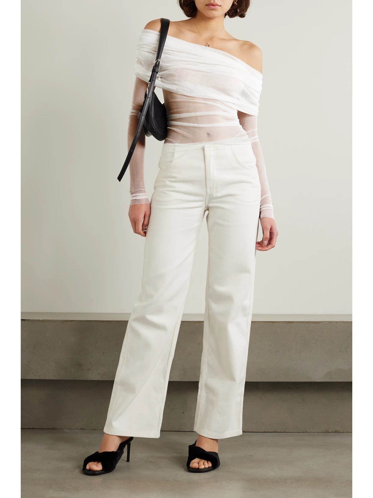 Image of a model wearing Tops. Product name - Off-the-shoulder Gathered Silk-tulle Top in White colour by brand - Christopher Esber