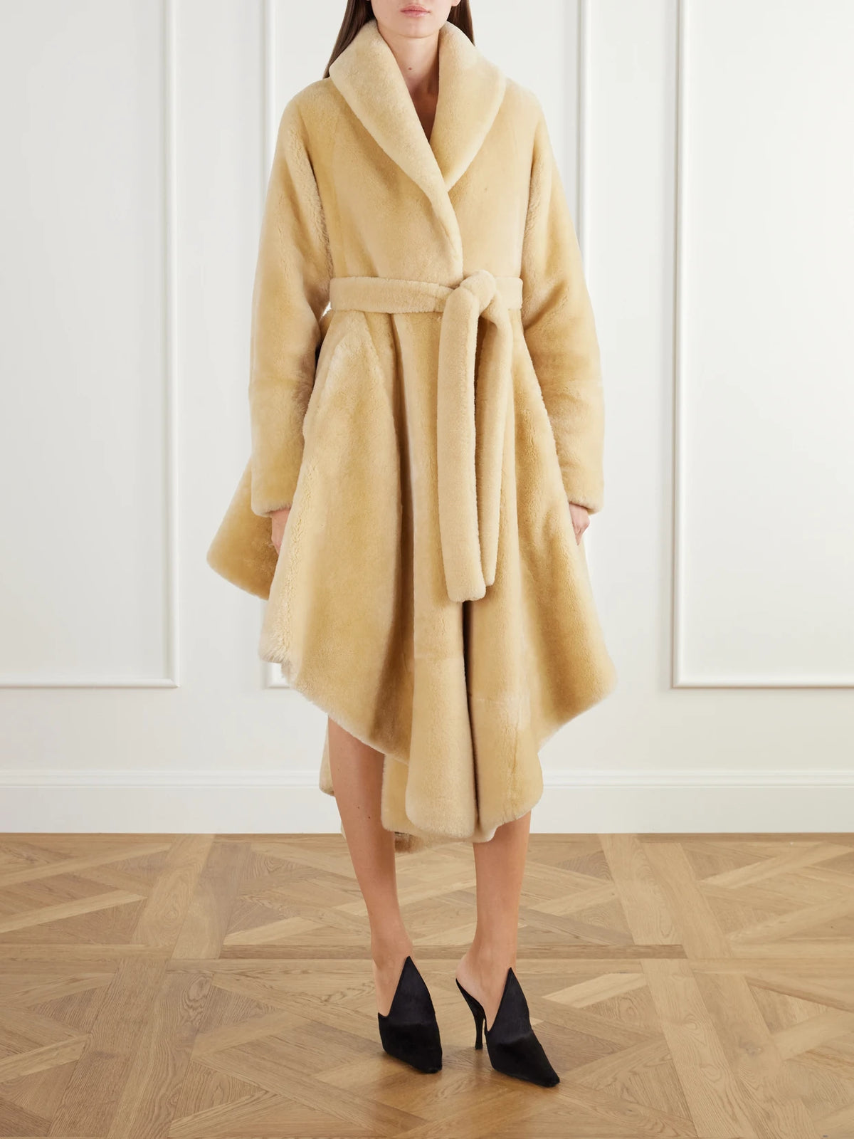 Image of Coats & Jackets. Product name - Asymmetric Belted Flared Shearling Coat in Beige colour by brand - Alaïa