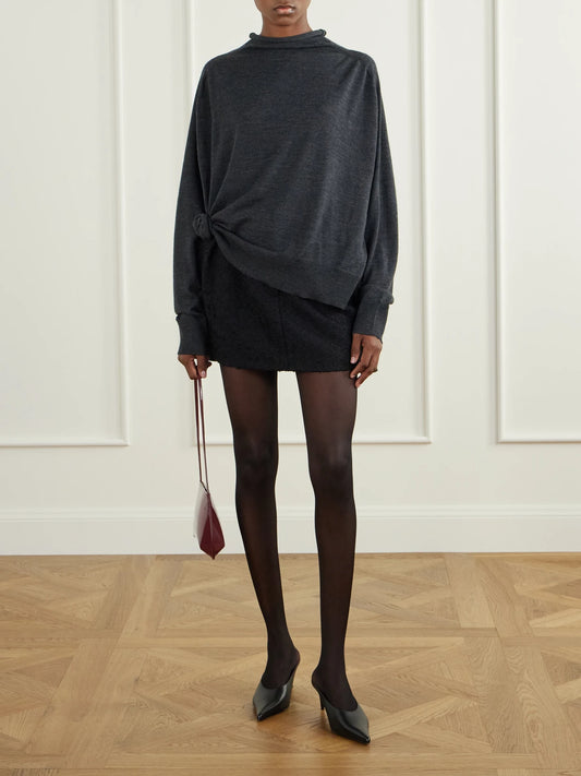 Image of a model wearing Outerwear. Product name - Knot-detail Wool Turtleneck Sweater in Dark gray colour by brand - Magda Butrym