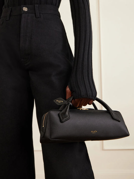 Image of Bags. Product name - Le Teckle Satin Clutch Bag in Black colour by brand - Alaïa