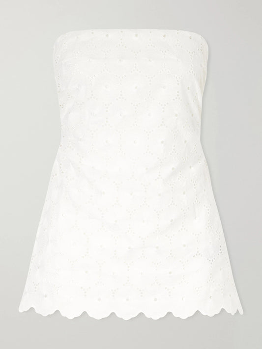 Image of a model wearing Tops. Product name - Pamina Strapless Scalloped Broderie Anglaise Top in White colour by brand - Faithfull