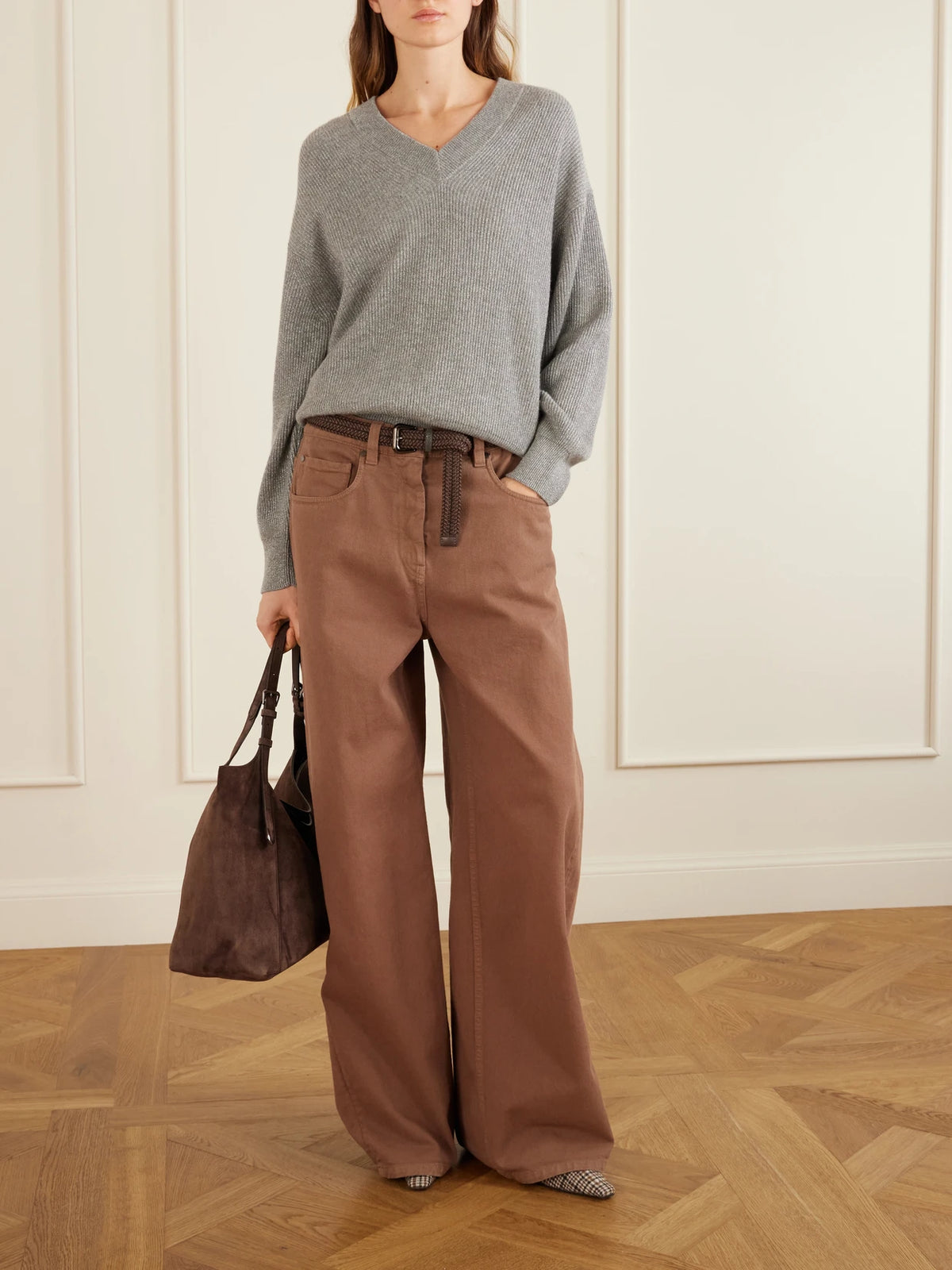 Image of a model wearing Outerwear. Product name - Ribbed-knit Metallic Cashmere-blend Sweater in Light gray colour by brand - Brunello Cucinelli