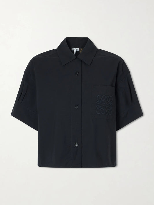 Image of a model wearing Tops. Product name - + Paula's Ibiza Anagram-embroidered Cotton-blend Shirt in Black colour by brand - LOEWE