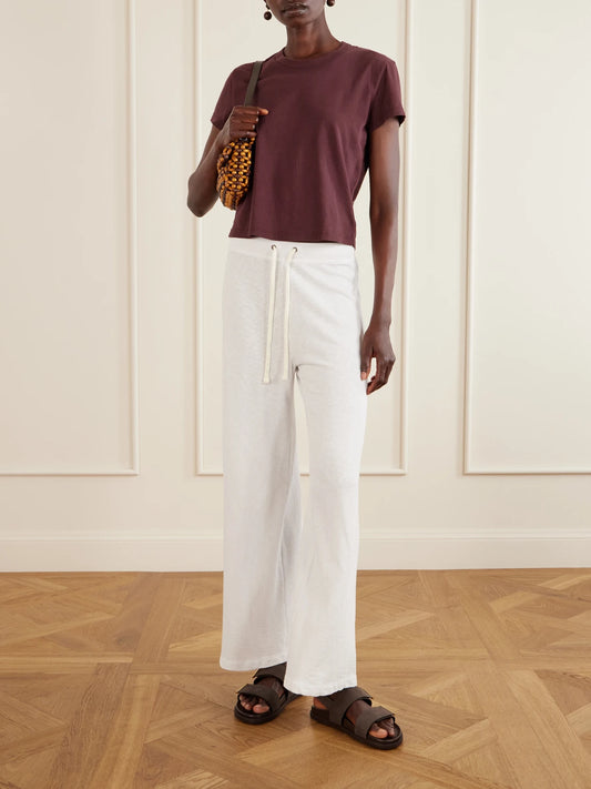 Image of a model wearing Tops. Product name - Cropped Cotton-jersey T-shirt in Burgundy colour by brand - James Perse