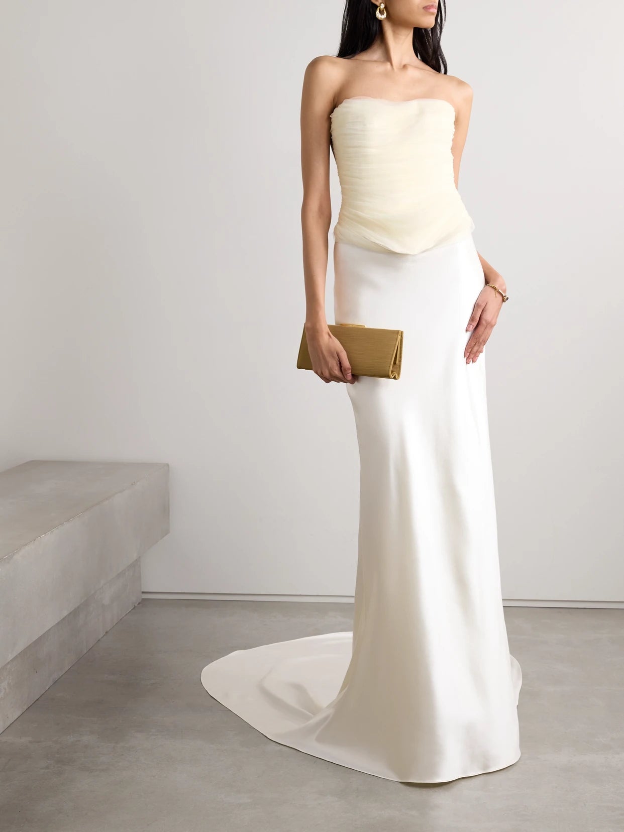 Image of a model wearing Tops. Product name - Milo Organza And Grosgrain-trimmed Ruched Tulle Bustier Top in Off-white colour by brand - Danielle Frankel