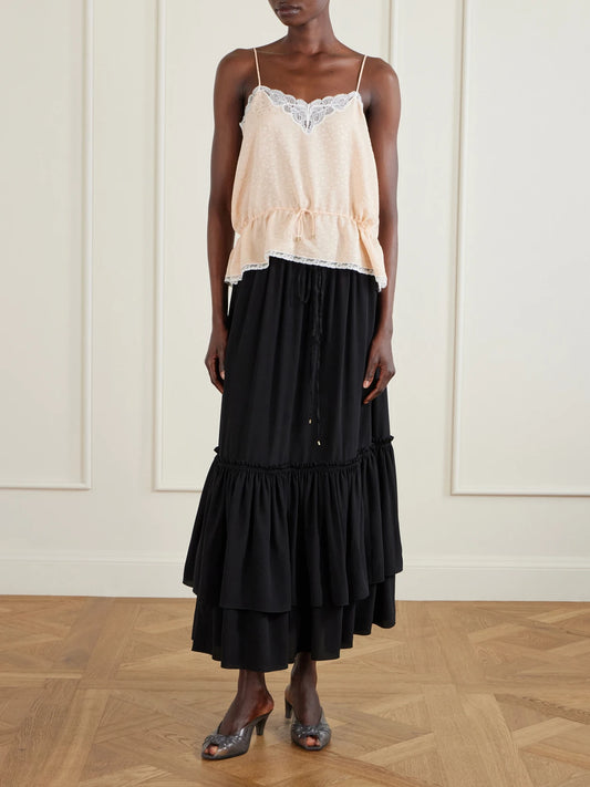 Image of a model wearing Skirts. Product name - Tiered Silk Crepe De Chine Maxi Skirt in Black colour by brand - Chloé
