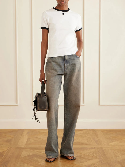 Image of a model wearing Tops. Product name - Cotton-jersey T-shirt in White colour by brand - COURREGES