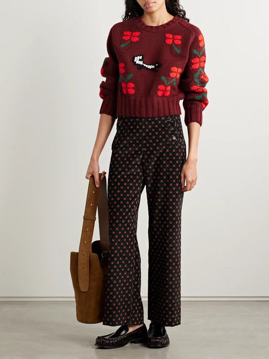 Image of a model wearing Pants. Product name - Mcallister Floral-print Cotton-corduroy Straight-leg Pants in Blue colour by brand - BODE