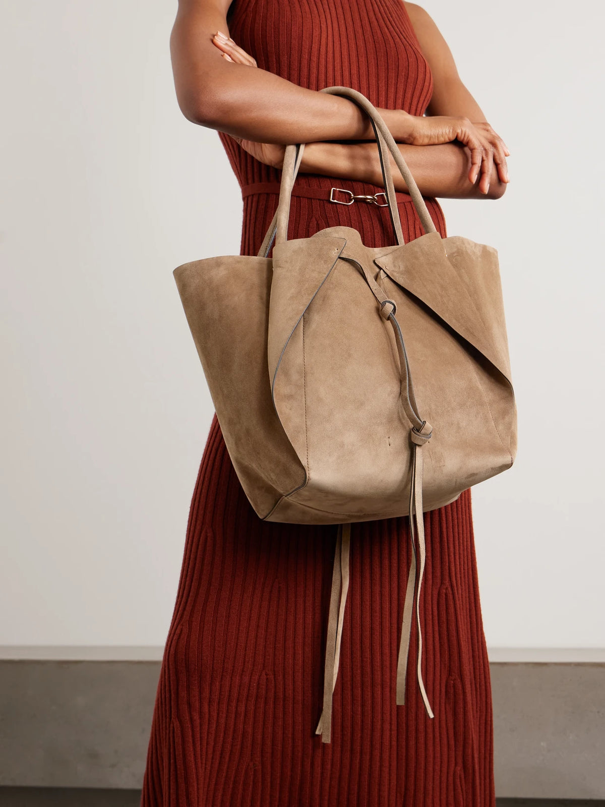 Image of Bags. Product name - Marija Tasseled Suede Tote in Taupe colour by brand - Gabriela Hearst