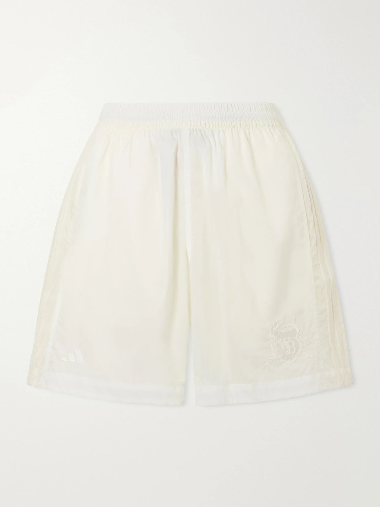 Image of a model wearing Shorts. Product name - + Wales Bonner Embroidered Shell Shorts in White colour by brand - adidas Originals