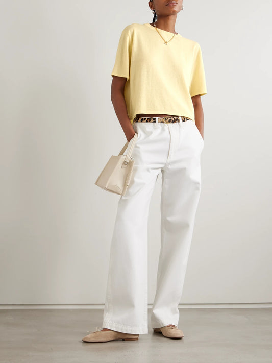 Image of a model wearing Tops. Product name - Rubie Cotton And Cashmere-blend T-shirt in Pastel yellow colour by brand - LISA YANG
