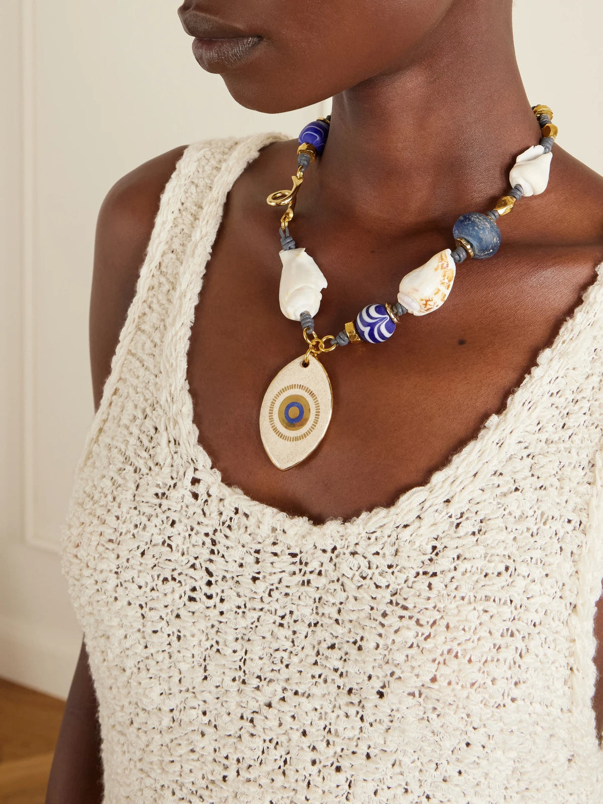 Image of Necklaces. Product name - Evil Eye Gold-plated, Seashell And Ceramic Necklace in Ivory colour by brand - Tohum