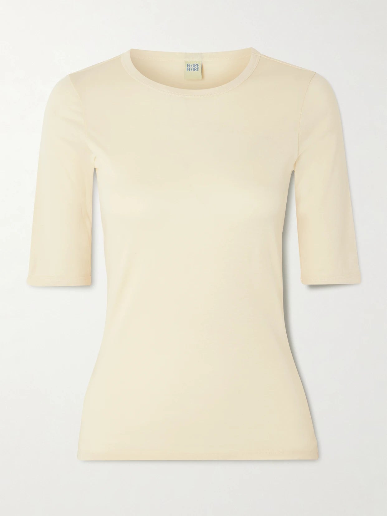 Image of a model wearing Tops. Product name - Anna Organic Cotton-jersey T-shirt in Ecru colour by brand - FLORE FLORE