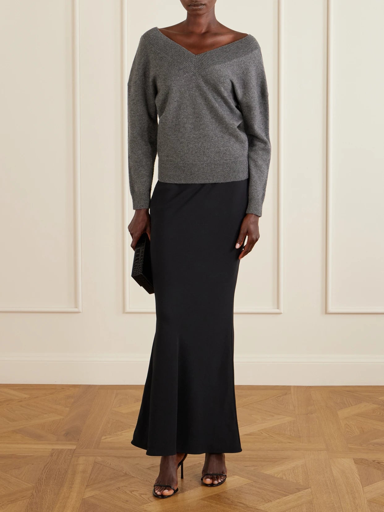 Image of a model wearing Outerwear. Product name - Off-the-shoulder Cashmere Top in Gray colour by brand - TOM FORD