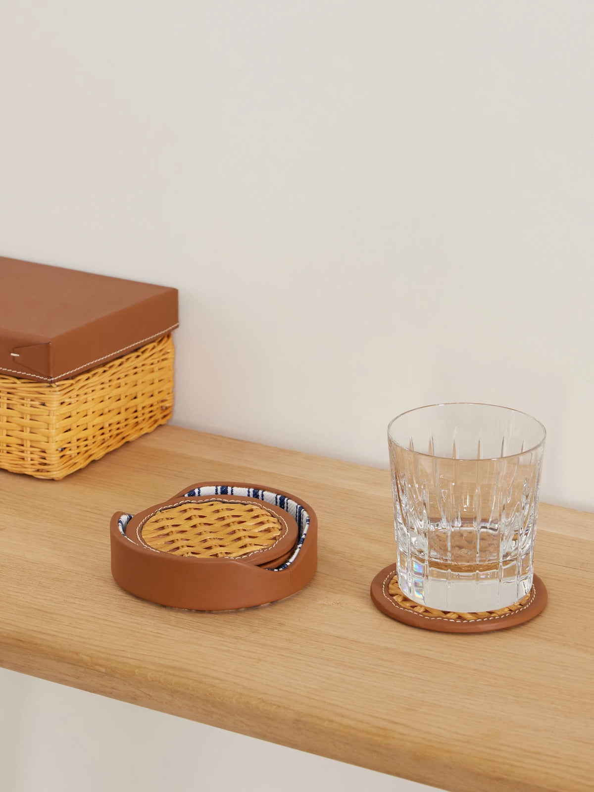 Image of Decor. Product name - Bailey Leather-trimmed Rattan-woven Set Of Four Coasters in Brown colour by brand - Ralph Lauren Home