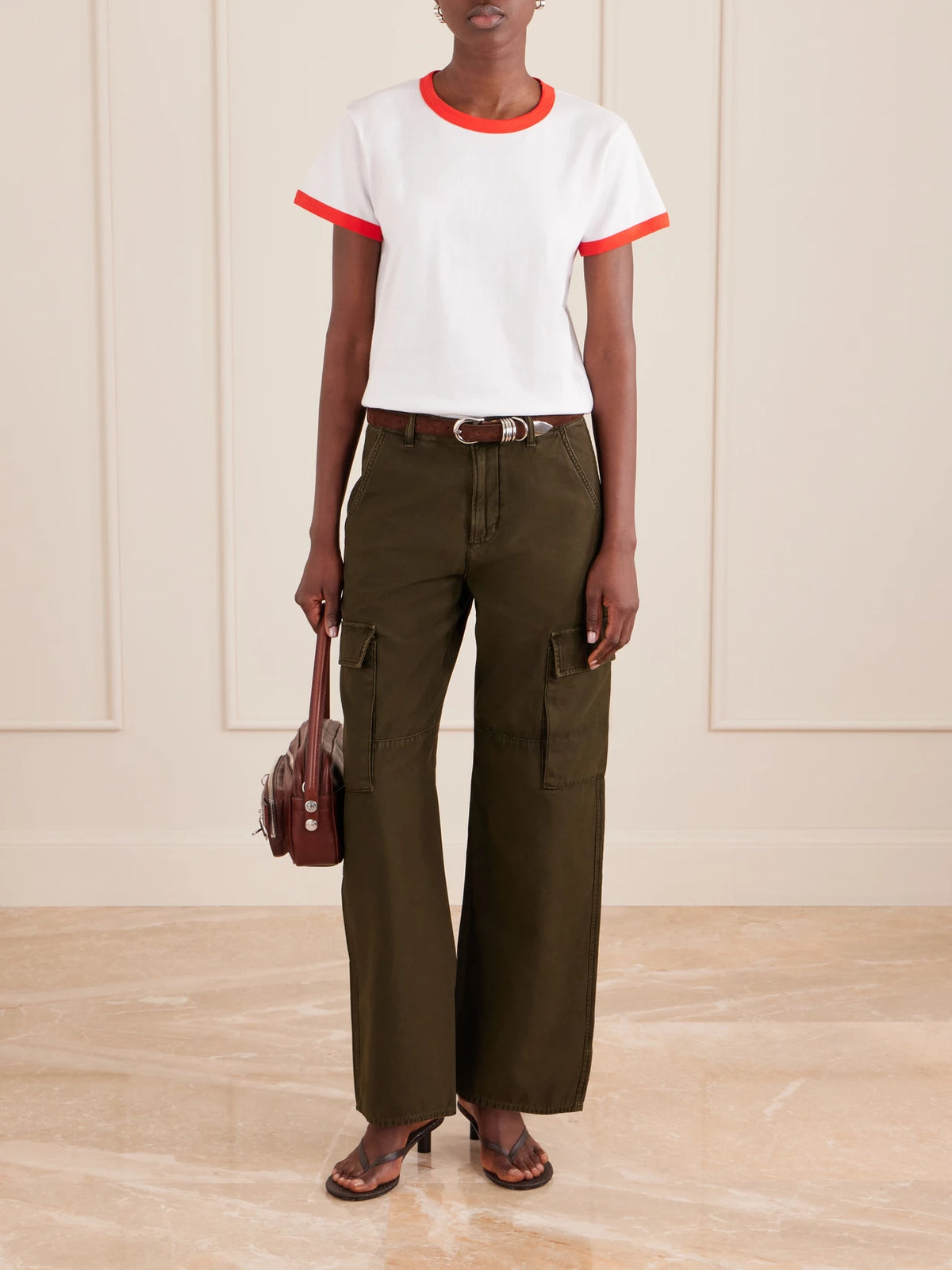 Image of a model wearing Pants. Product name - Esme Organic Cotton-twill Wide-leg Cargo Pants in Army green colour by brand - Citizens of Humanity