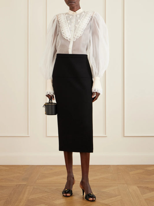 Image of a model wearing Tops. Product name - Silk-organza Blouse in Ivory colour by brand - Valentino Garavani